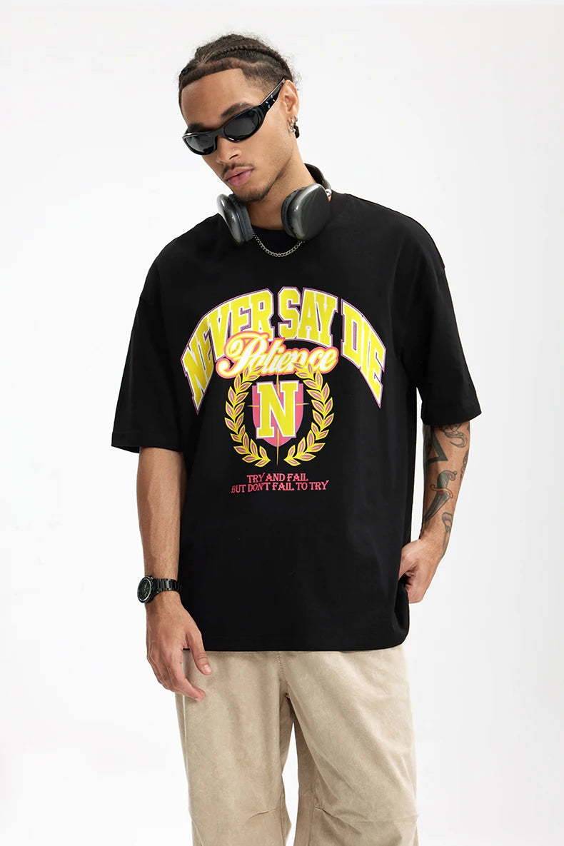 Model wearing the black Relentless Spirit T-Shirt in a gray background