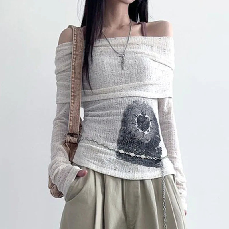 Model wearing the white Off-Shoulder Graphic Print Top