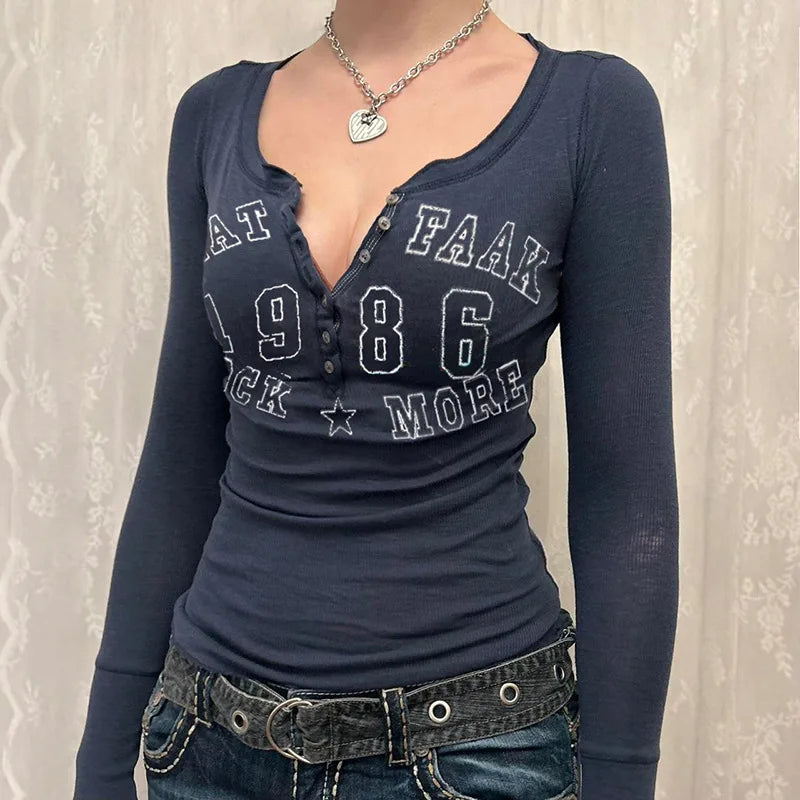 Model wearing the navy blue Y2K Rockstar Revival Henley T-Shirt