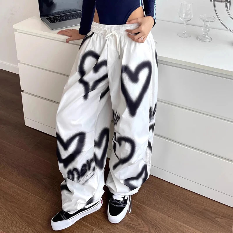 Model wearing the white Graffiti Heart Lounge Pants