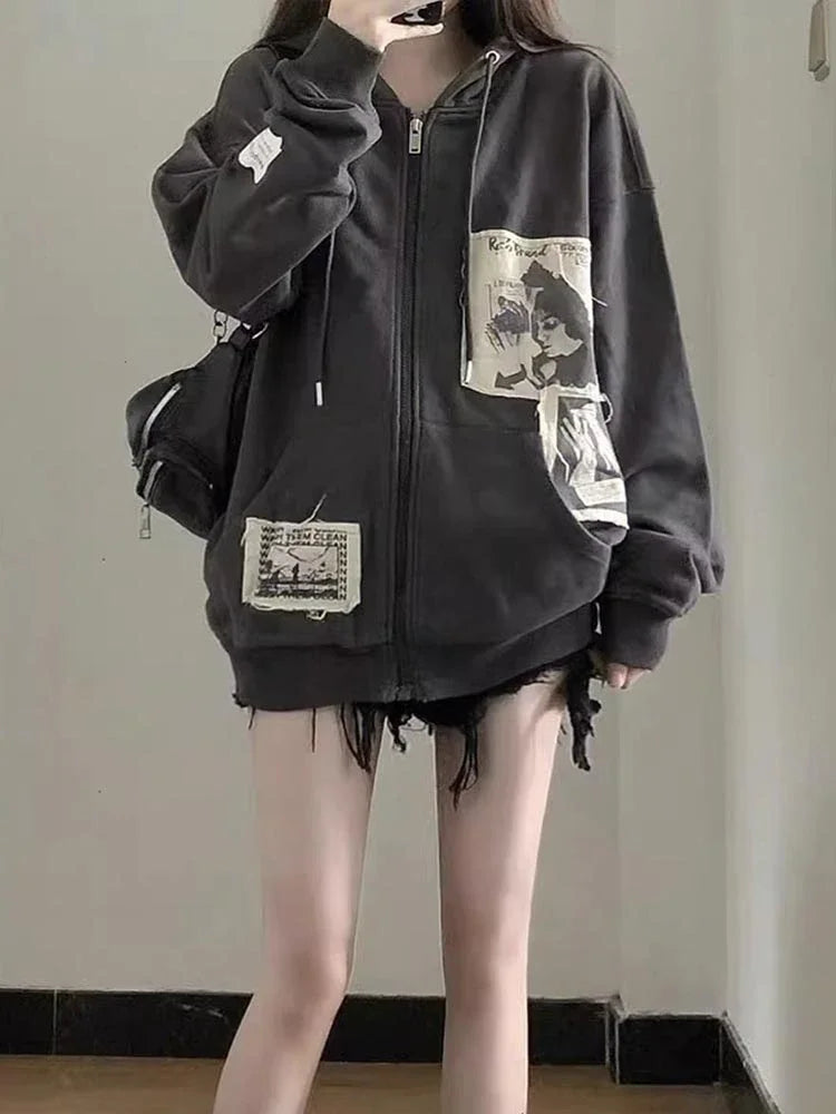 Model wearing the black Geometric Pattern Zip-Up Sweatshirt