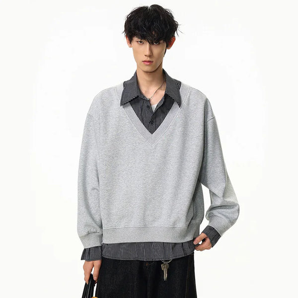 Schmeichelhaftes, lässiges, lockeres, gestreiftes Polo-Sweatshirt