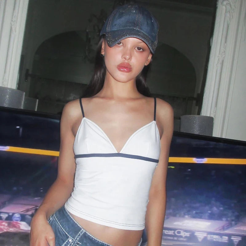 Model wearing the white Sleek Knit Crop Top