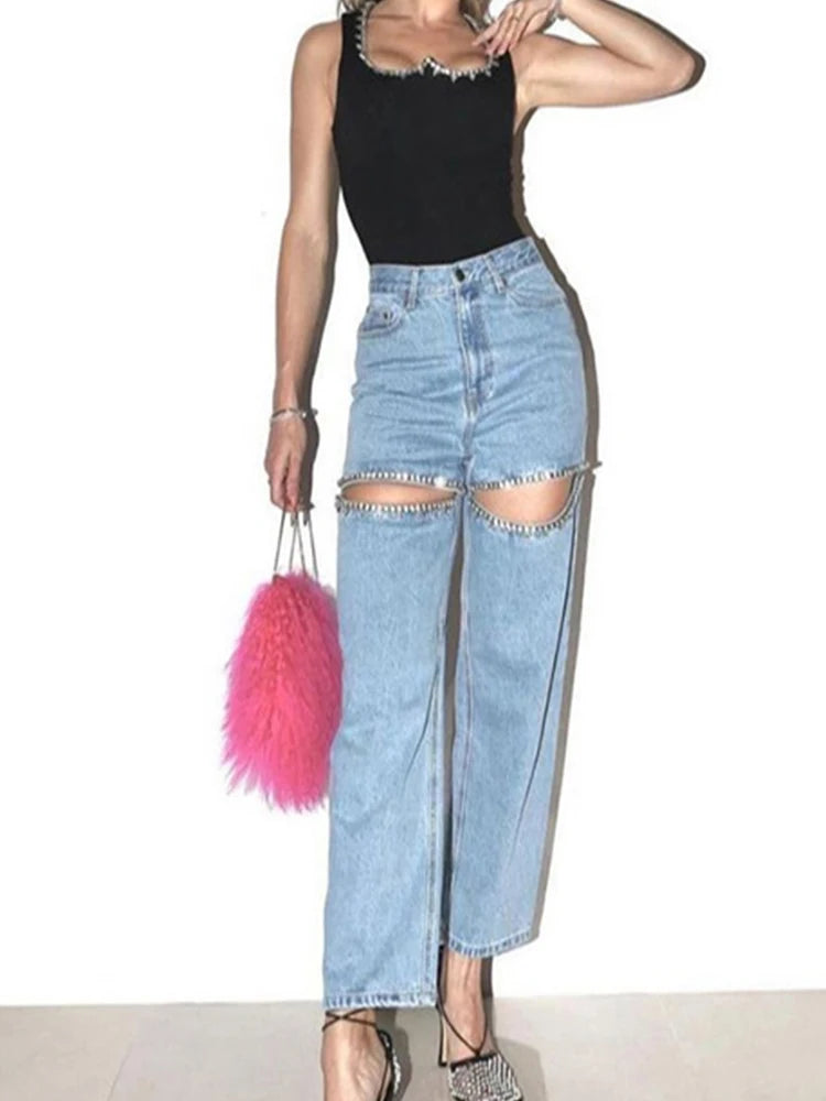 Model wearing the blue Embellished Baddie Cut-Out Jeans