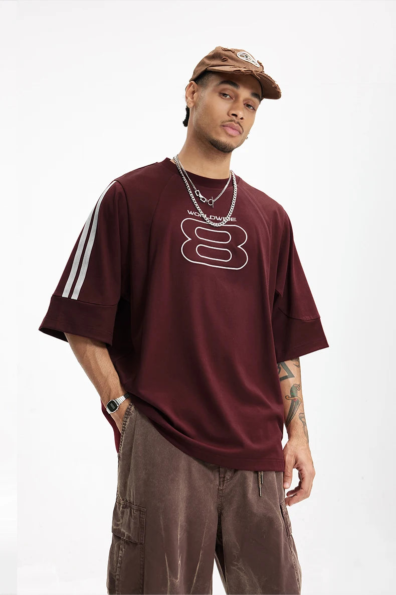 Model wearing the dark red Y2K Infinity T-Shirt 