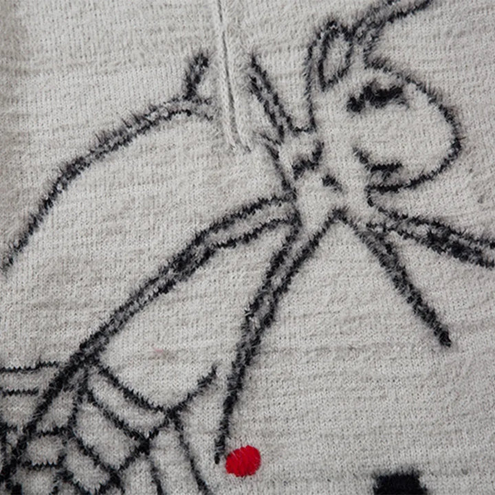 Details of the Vintage Zipper Spider Web Sweater showing the spider print