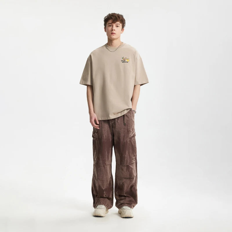 Model wearing the khaki Iconic Pulse T-Shirt