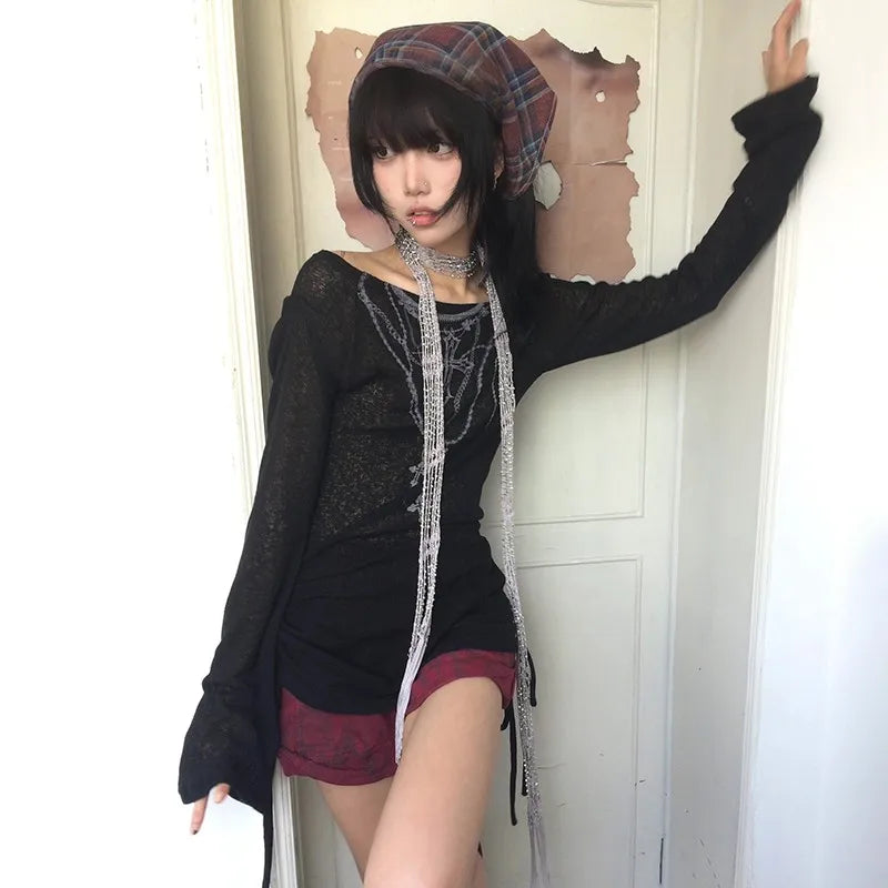 Model wearing the black Off-Shoulder Long-Sleeve T-shirt