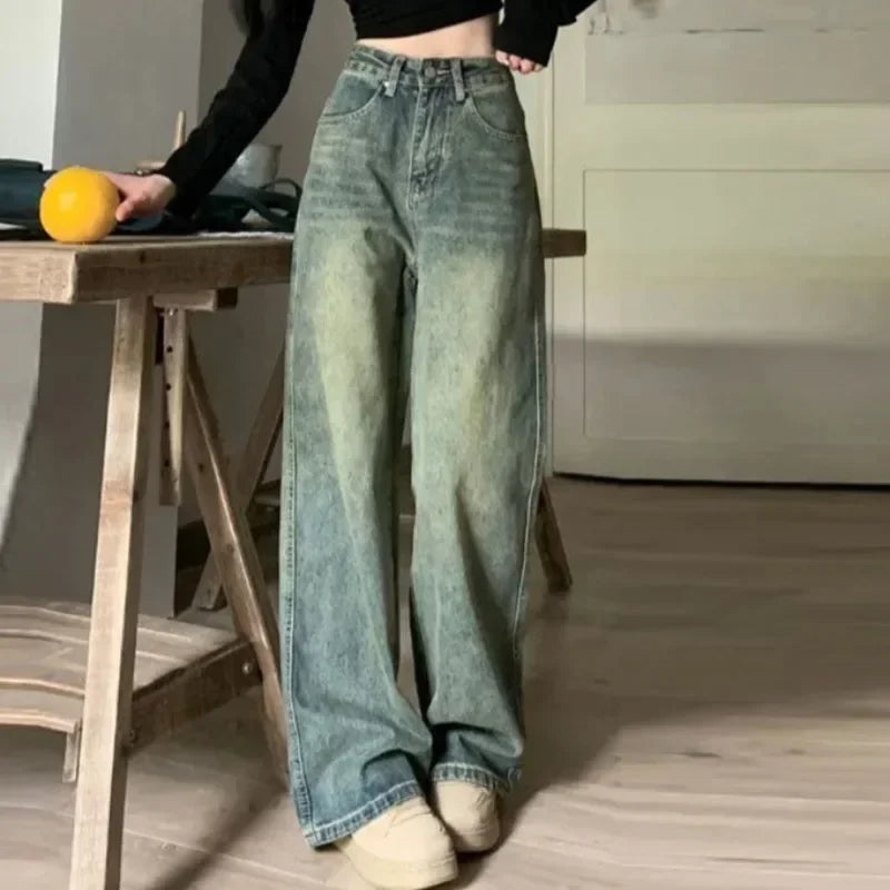Model wearing the blue Vintage High-Waisted Wide-Leg Jeans