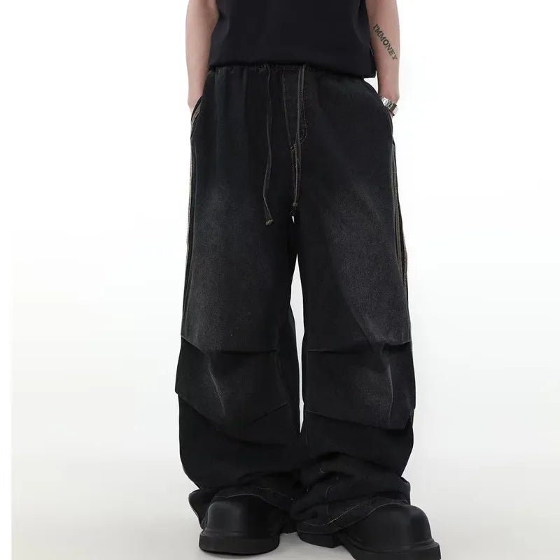 Model wearing the black Velvet Street Baggy Pants