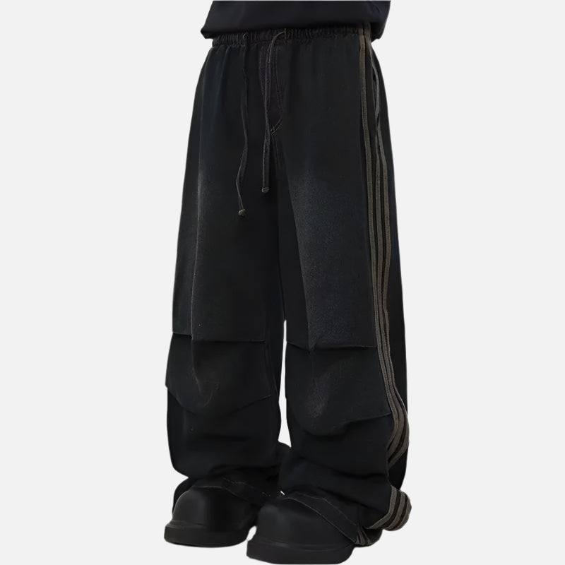 Model wearing the black Velvet Street Baggy Pants