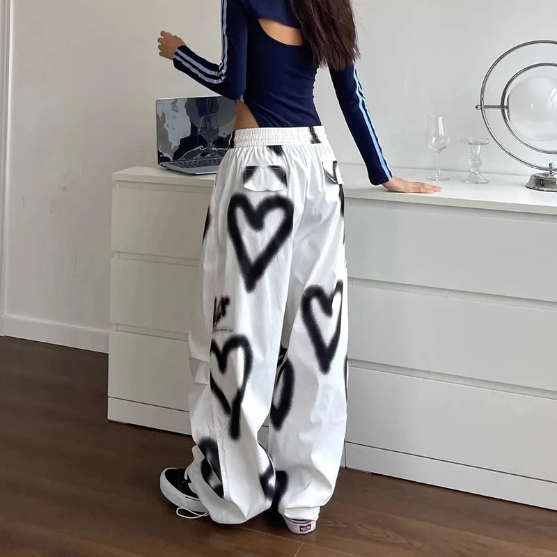 Model wearing the white Graffiti Heart Lounge Pants