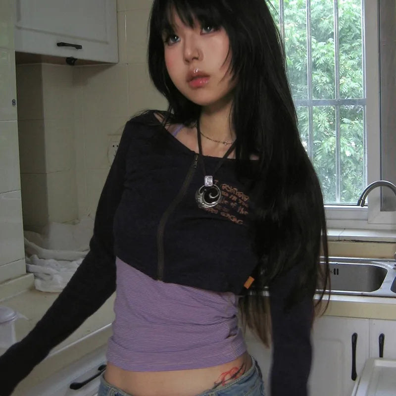 Model wearing the black Uplifting Crop T-shirt