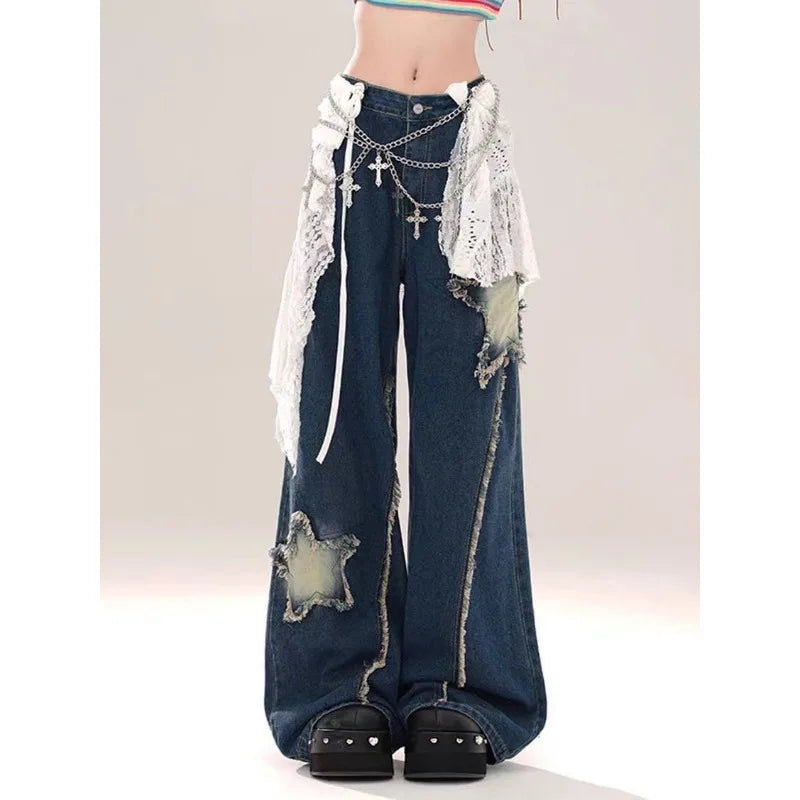 Model wearing the blue Distressed Star Patch Flare Jeans 