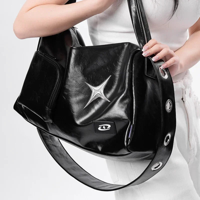 Model wearing the black Star Design Shoulder Bag