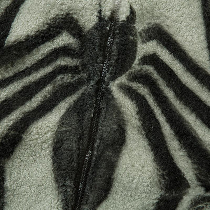 Details of green Loose Spider print Fleece Zip-up Jacket showing the spider print