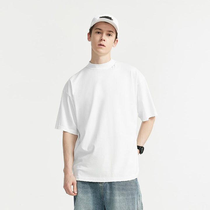 A model wearing the white High-neck Respecting Solid Loose T-shirt