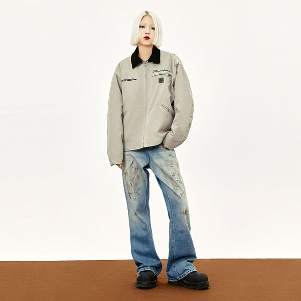 Model wearing the grey Y2k Loose Retro Solid Jacket in a gray background 
