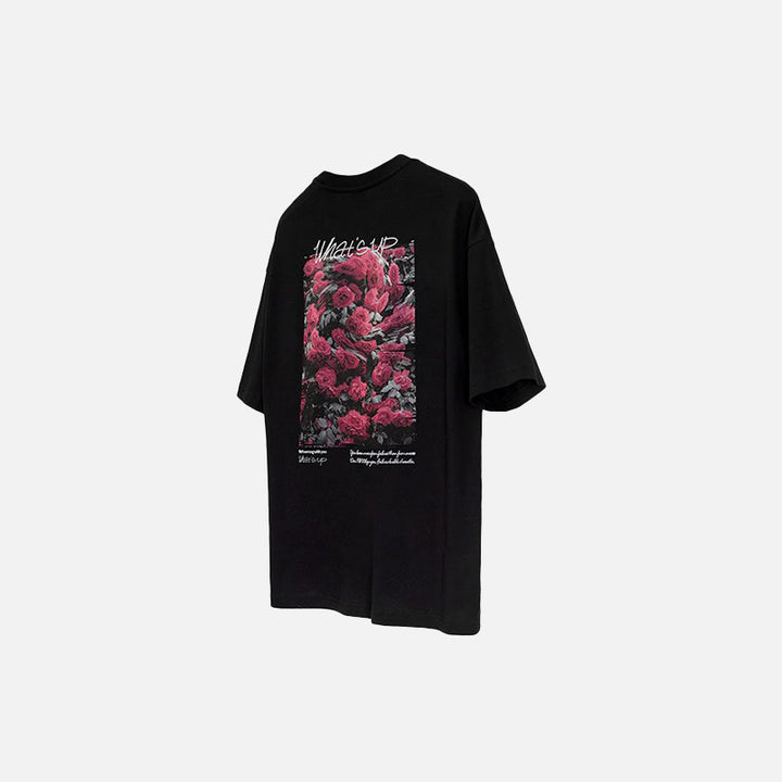 Front view of the black Loose Rose Flower Print T-shirt in a gray background 