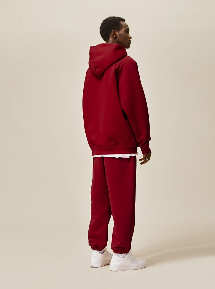 A guy wearing red Explorer Tracksuit back view