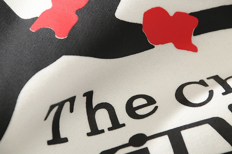 details of the white The Chosen Kid Cudi Hoodie showing the print of the hoodie