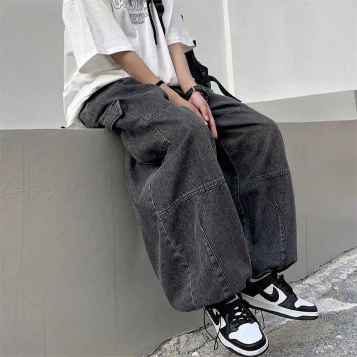 A model setting while wearing the gray Baggy Elastic Waist Pants from DAXUEN