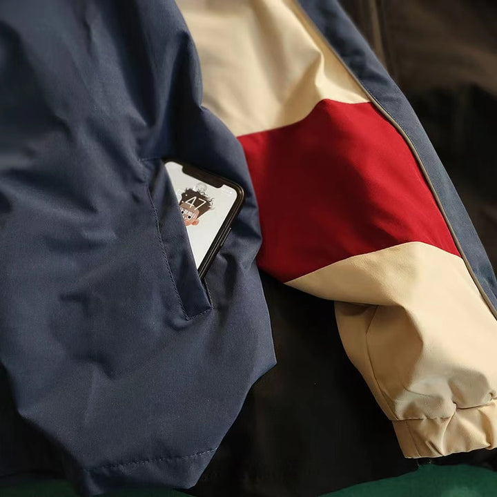 Details of the Patchwork Color Block Thin Jacket showing the pockets and the sleeves