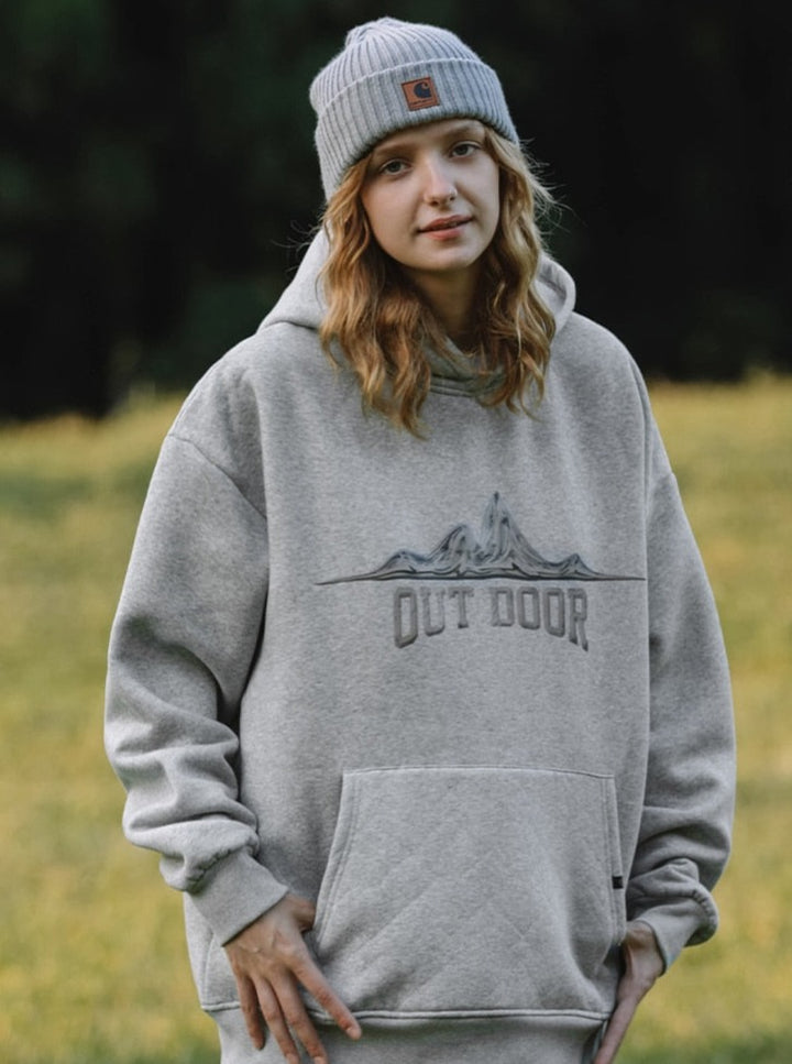 A girl wearing grey Outdoor Hoodie