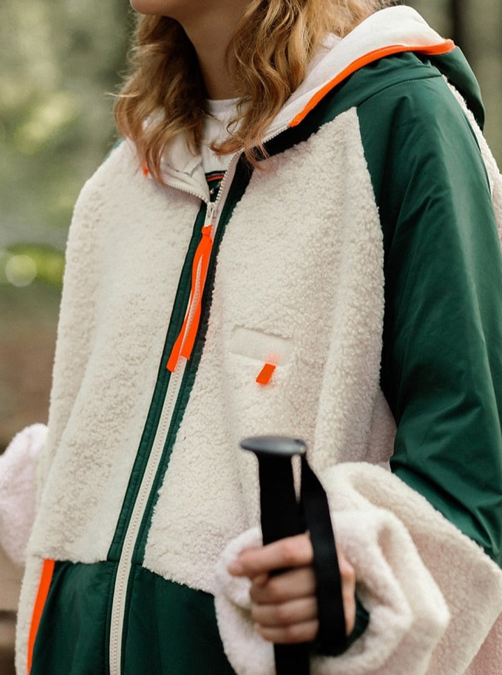A girl wearing color block jacket side view