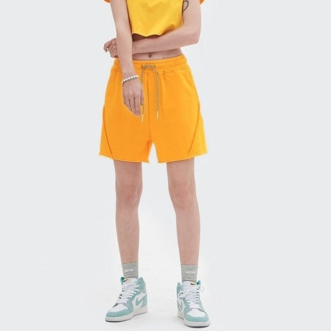 Girl wearing yellow DAXUEN Jersey Lounge Shorts