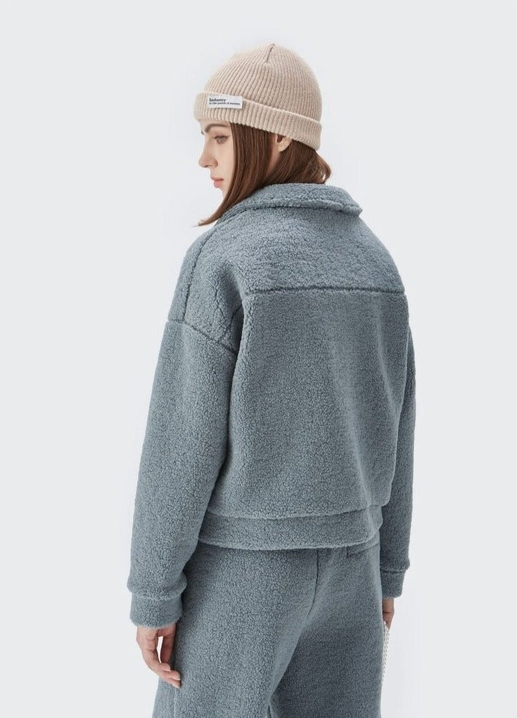 A girl wearing gray blue DAXUEN Lambs Wool Thick Set